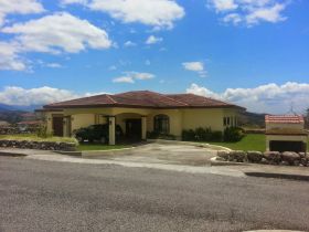 Boquete nice home street view with clouds – Best Places In The World To Retire – International Living